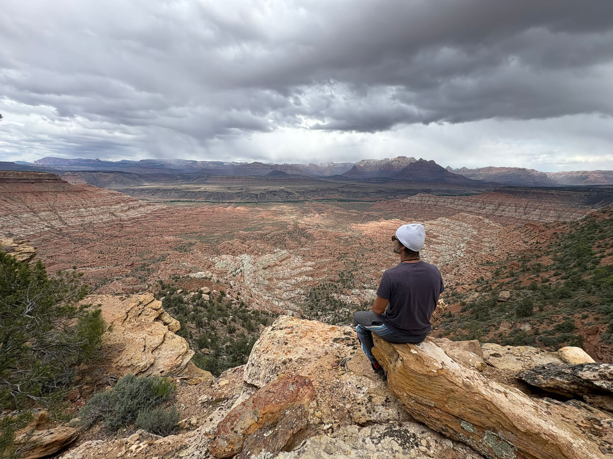 Looking out over canyon country from a rocky ledge, Zion area, Utah